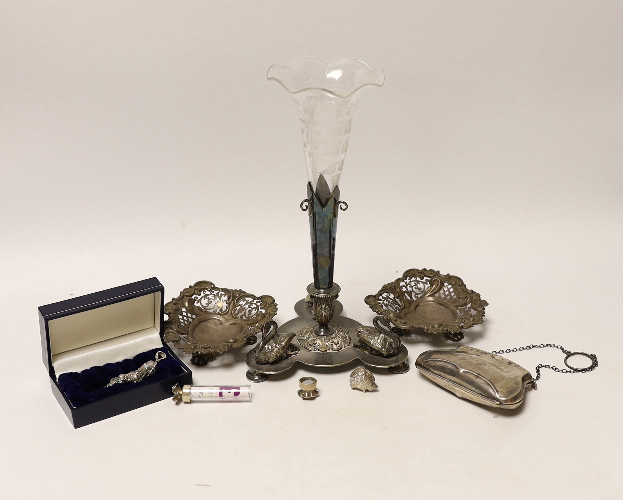 A pair of Edwardian pierced silver bonbon dishes, four other modern silver items and a plated centrepiece with glass vase.